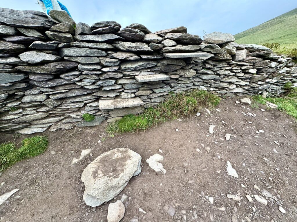 the stone wall you'll shimmy over