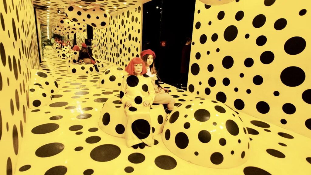 Kusama inside one of her polka dot installations