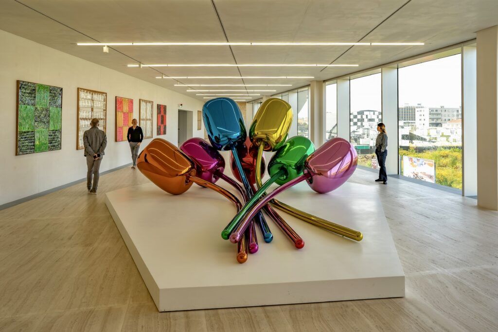 gallery in the Prada Foundation with a Jeff Koons tulip sculpture