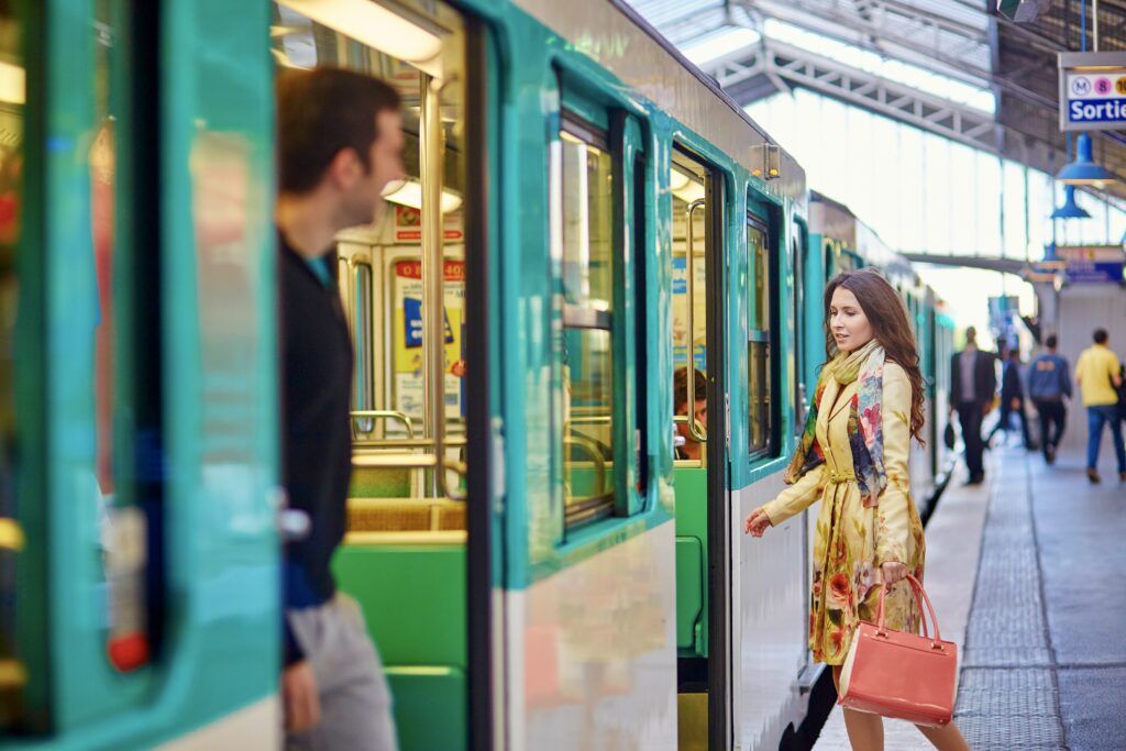 woman getting on the metro in Paris
