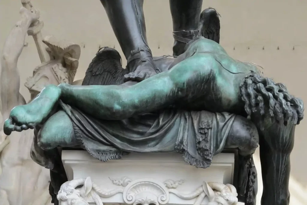 detail of hte Cellini sculpture showing Medusa