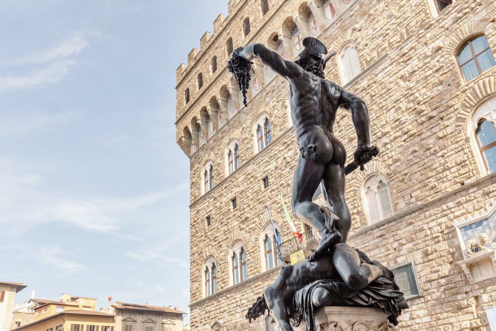 the Perseus statue against the Palazzo Vecchio in the background