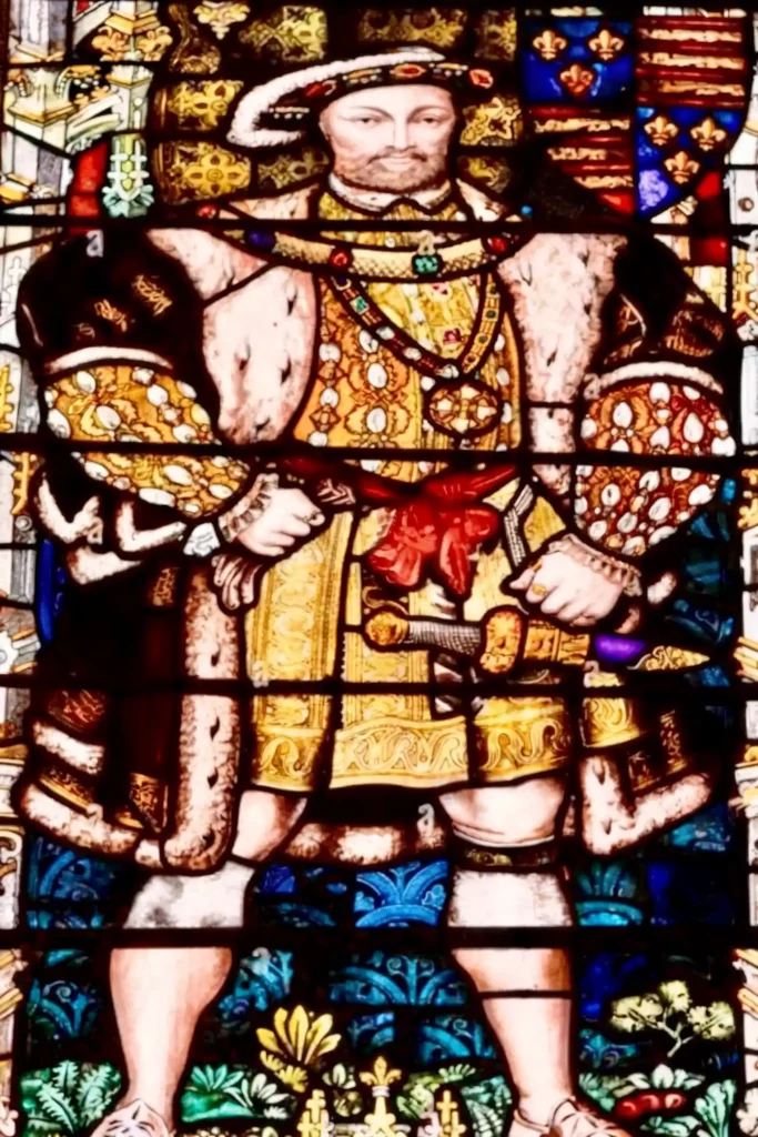 stained glass image of Henry VIII in the Chapter House