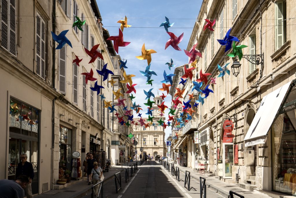 street decorated with colorful stars in Arles