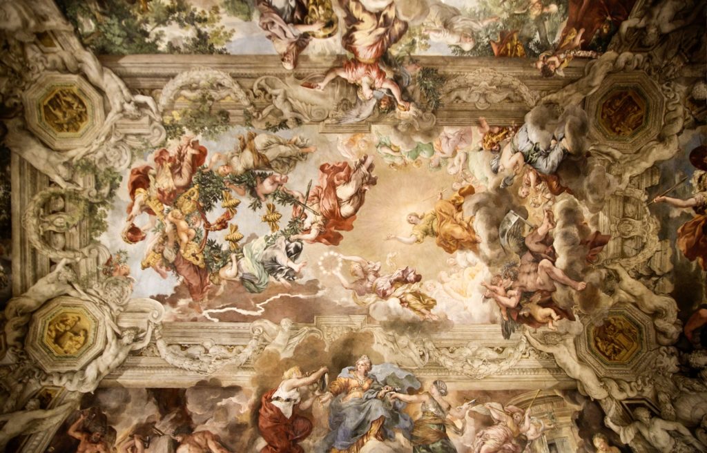 the frescoed vault ceiling painted by Pietro da Cortona in the main salon 