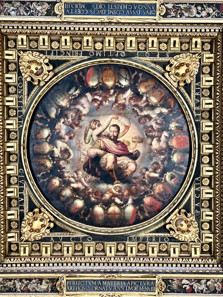 Cosimo I as the center of the universe in one of the ceiling panels