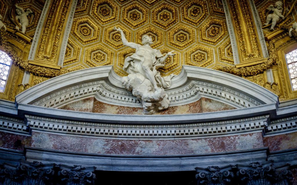 statue of St. Andrew, designed by Bernini above the altar