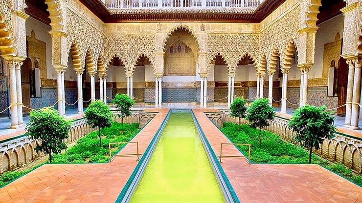 Courtyard of the Maidens with its long reflecting pool in the Alcázar