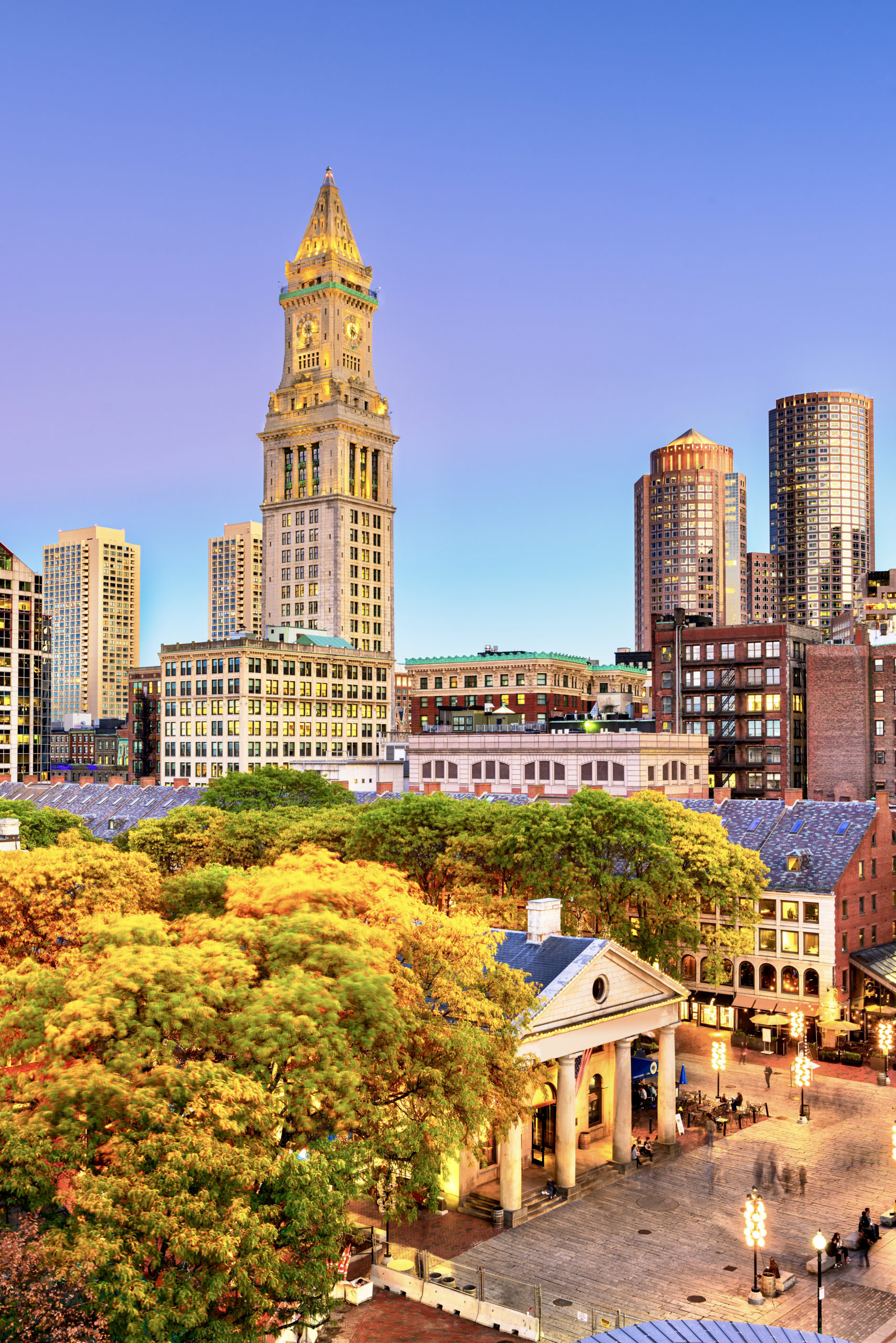 Boston, Massachusetts, USA skyline with Faneuil Hall and Quincy Market at dusk.