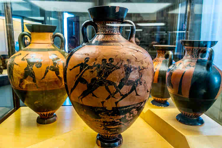 ancient Etruscan vases with black figures in the Gregorian Etruscan Museum