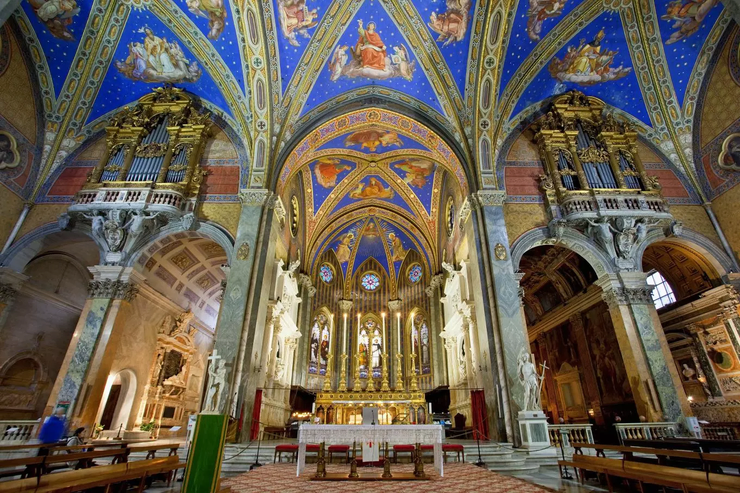 the blue vaulted Gothic nave