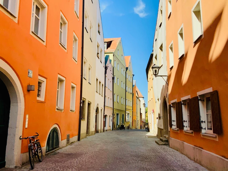 a colorful street in the old town of Regensburg
