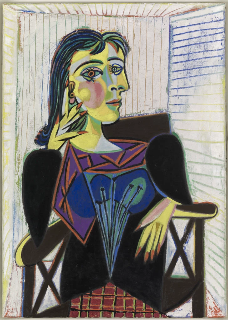 This is possibly my favorite piece in the Picasso Museum. Dora Maar is represented majestically seated in an armchair, smiling and resting her head on a long-fingered hand. The face is shown in a combined frontal and profile view, with a red eye and a green eye facing in different directions. These deformations are the very hallmark of Picasso's art. They primarily serve an expressive purpose: the idea is less to remake reality than to express its possibilities, to capture all the aspects of the sitter.