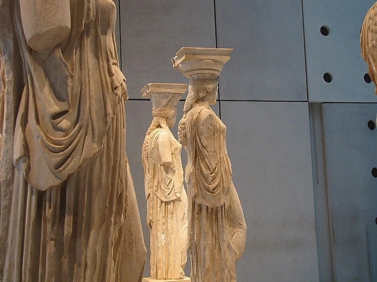 the original Caryatids from the Erechtheion, on display in the Acropolis Museum