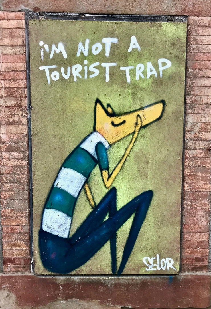 a sign in Carcassonne that greets you as you park