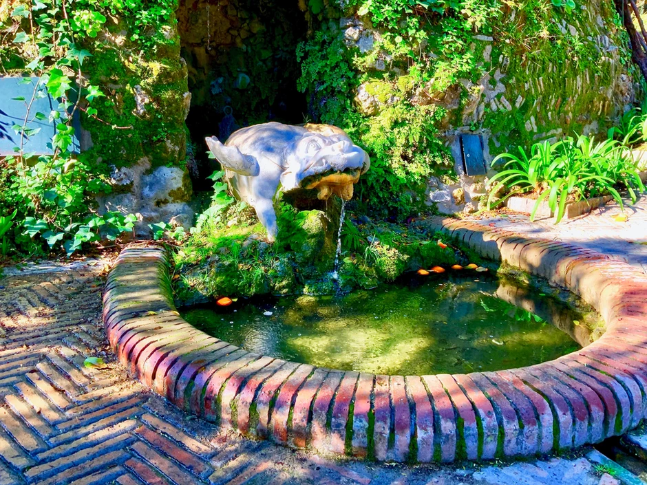 a tiny fountain in the Alcazar Gardens