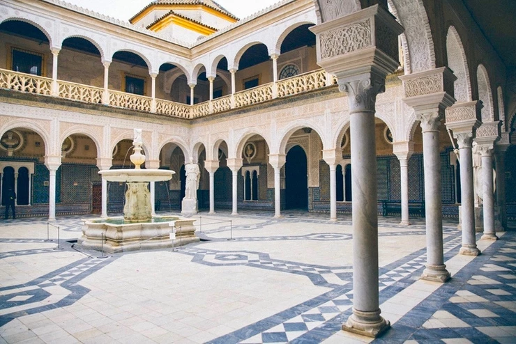the marble courtyard of the Casa de Pilatos