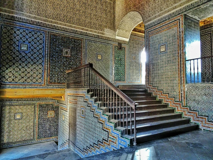 the grand staircase leading to the upper floor of Casa de Pilatos 
