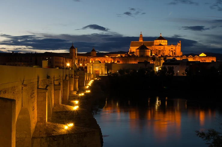 the Roman Bridge of Cordoba Spain lit up at night
