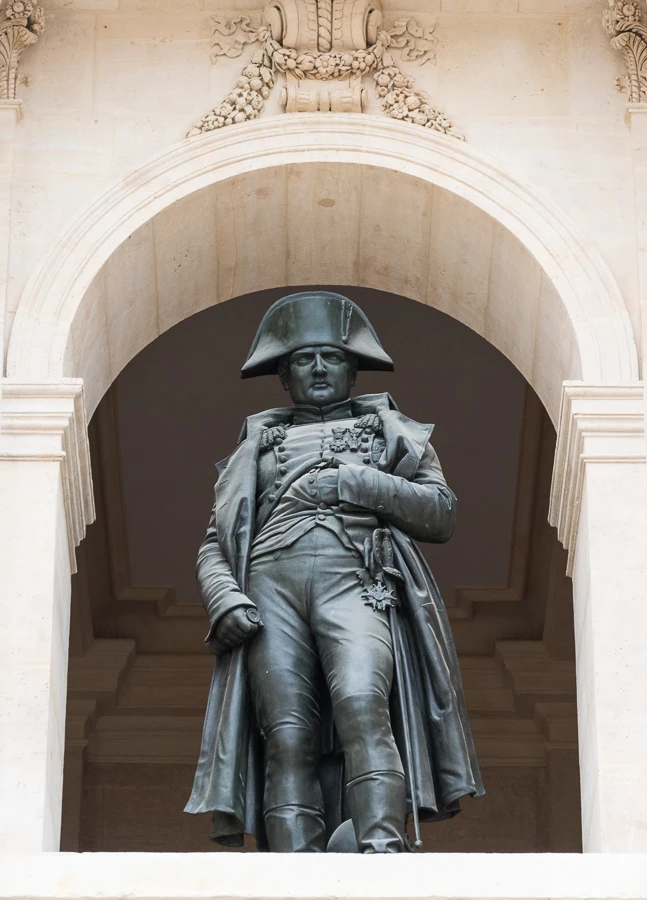 a statue of Napoleon guards Les Invalides