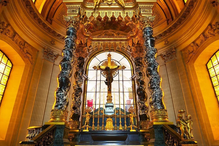the garish high altar of the royal chapel in Les Invalides 