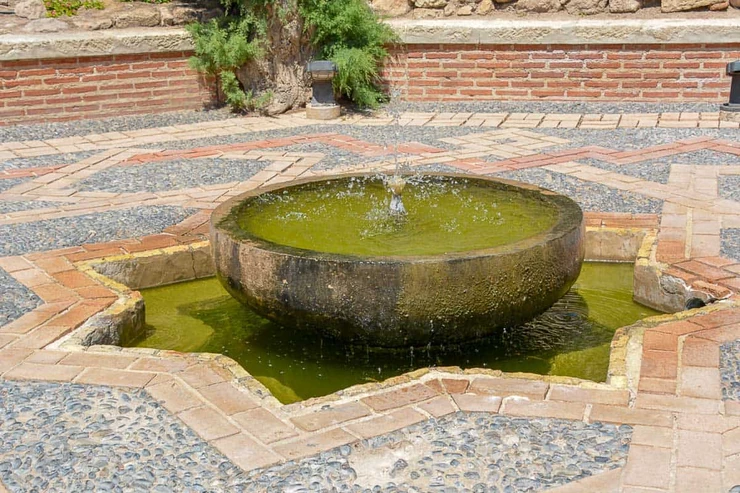 a fountain in the Alcazaba gardens