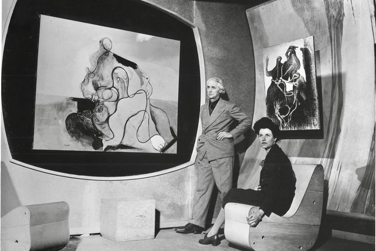 Peggy and Max with his painting, The Kiss, 1927, at the Art of this Century Gallery