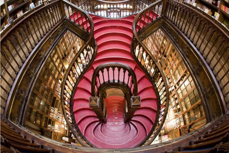 Livraria Lello's iconic crimson staircase