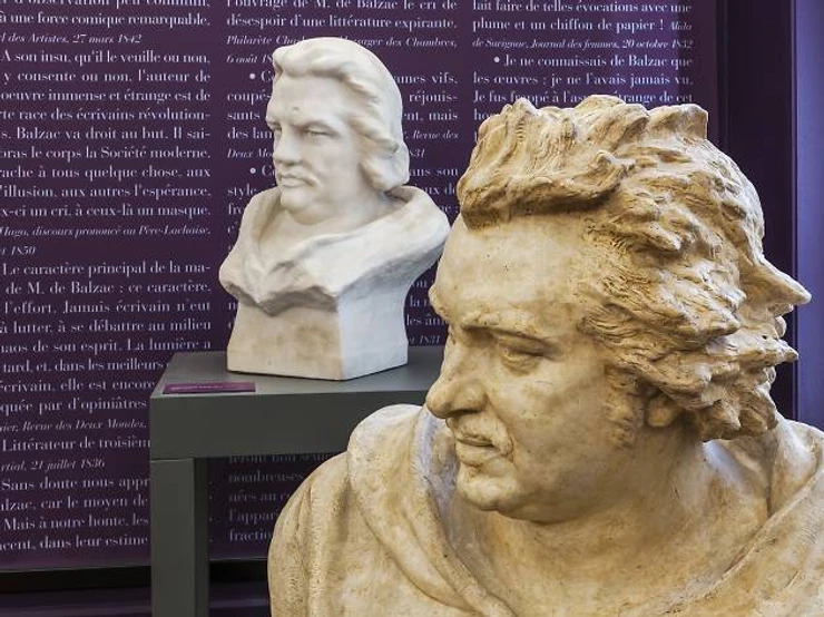 a bust of Balzac along with with a "family tree" of his characters that extends across several walls