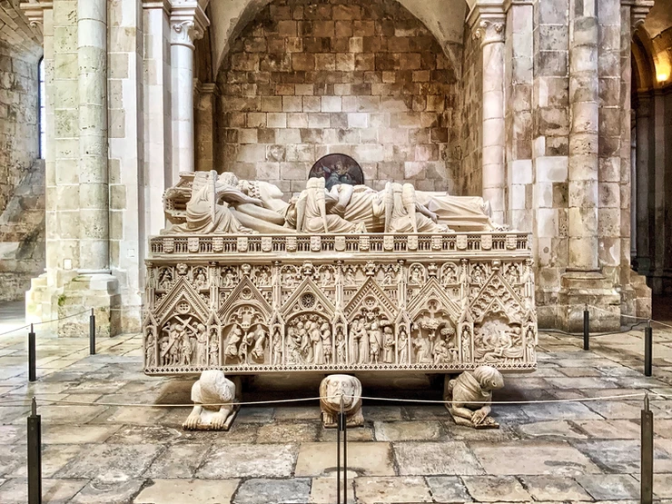 the ornate tomb of Inês de Castro in Alcobaça Monastery