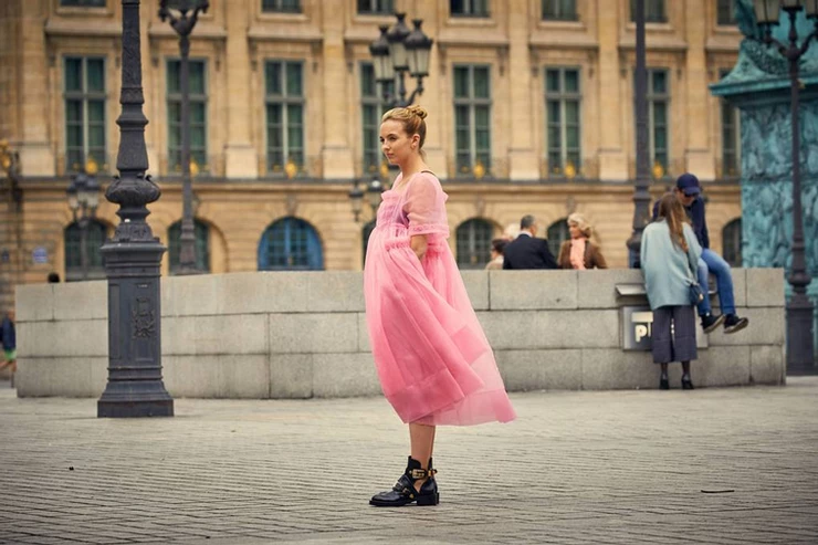 Villanelle in gauzy pink and black military boots
