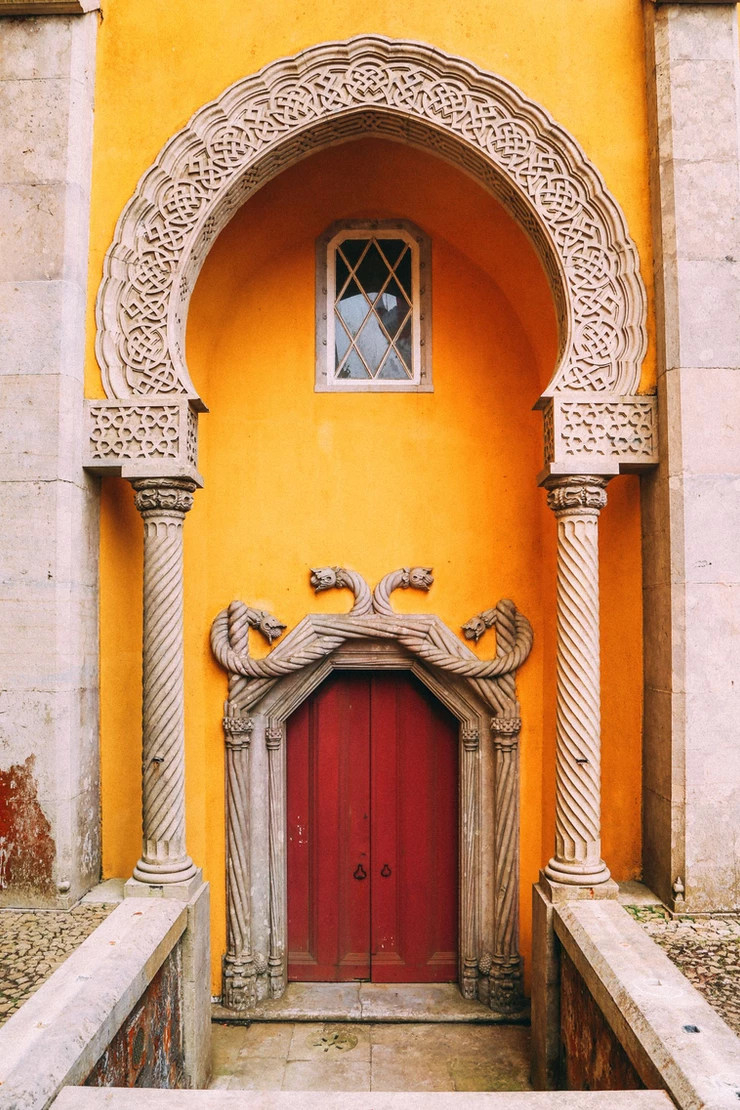 a Moorish doorway with slithery snakes