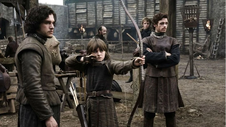 the future king, Brandon Stark, practices his bows and arrows in the game of Thrones series premiere