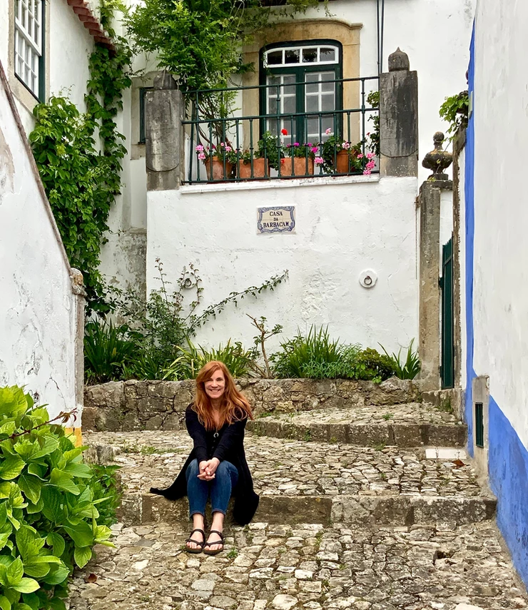 hanging out on a cobbled pedestrian street in Obidos