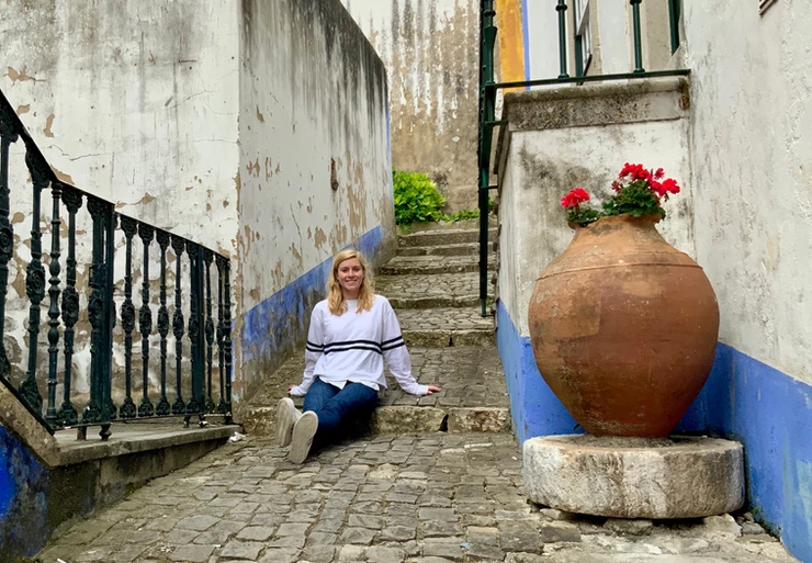 my daughter on a cobbled lane in Óbidos