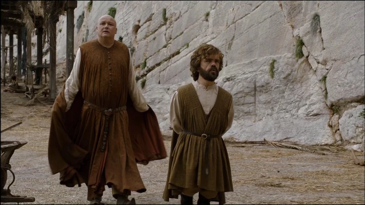 Varys and Tyrion walk through the streets of Mereen, aka Klis Fortress