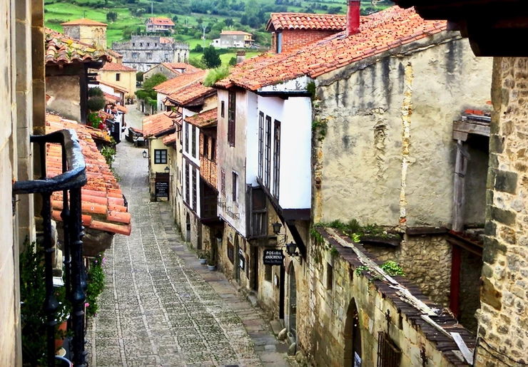 a cobbled lane in the medieval village of Santillana del Mar in Cantabria Spain
