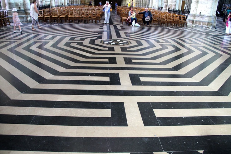 the black and white stone labyrinth of Amiens Cathedral