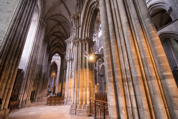 the interior of Rouen Cathedral with its massive columns