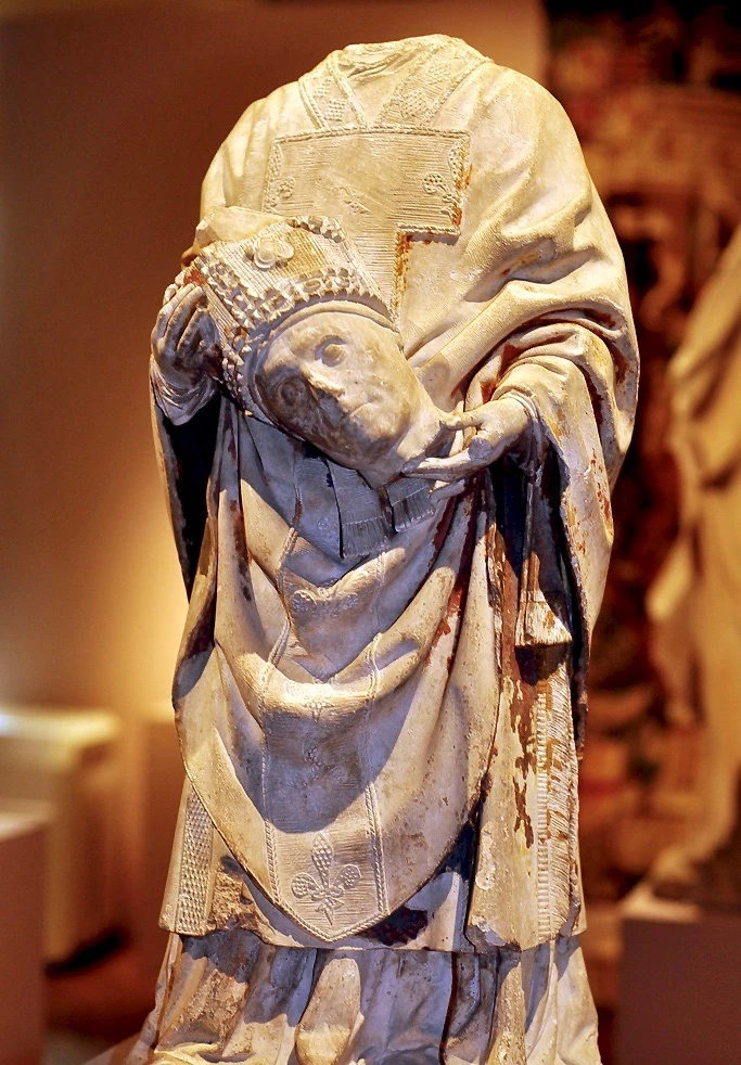 statue of Saint Denis in Paris' Cluny Museum