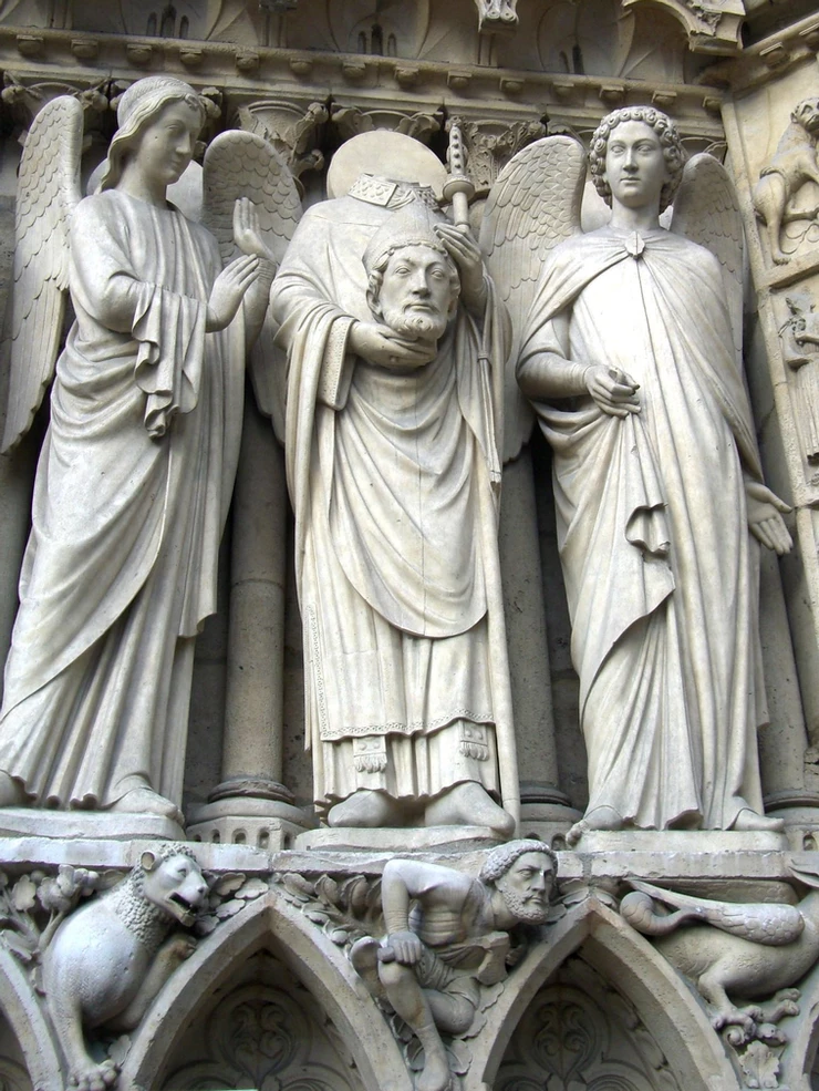 the decapitated Saint Denis on the facade of Notre Dame