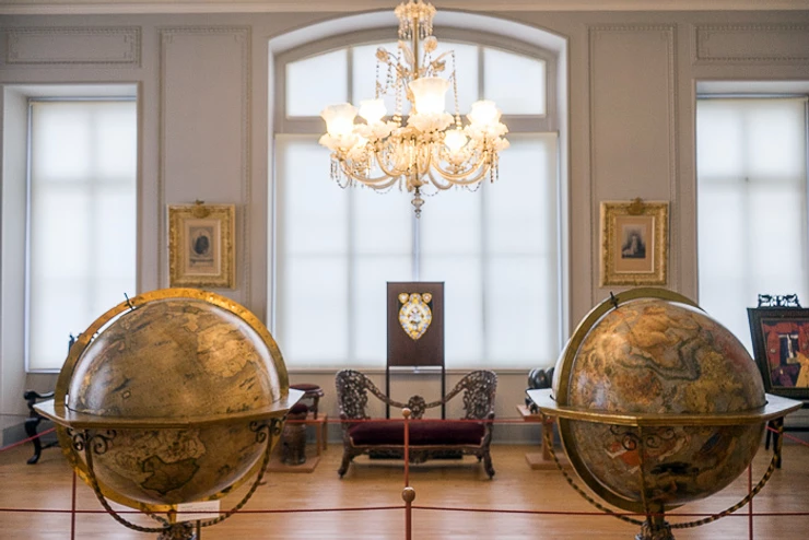you're greeted by two 16th century Italian globes, one of the known world and one of the constellations