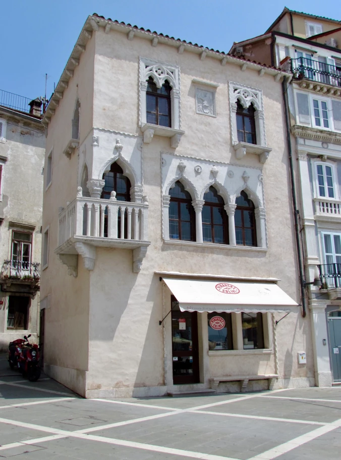 Piran's 15th century Venetian House, which was not red when I saw it in August 2017.