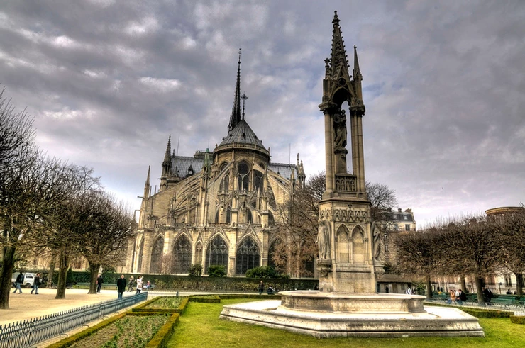 the rear facade and garden of Notre Dame in Paris