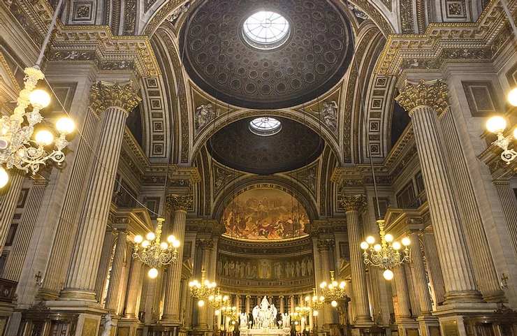 the interior nave and domes of La Madeleine Church