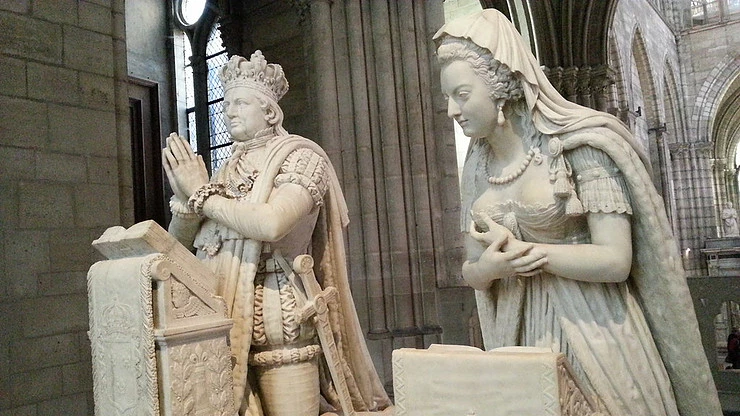 The funerary statues of Louis XVI and Marie Antoinette in prayer. They were guillotined in 1793. In 1815, the effigies were commissioned by Louis XVIII, to put an exclamation point on the restoration.