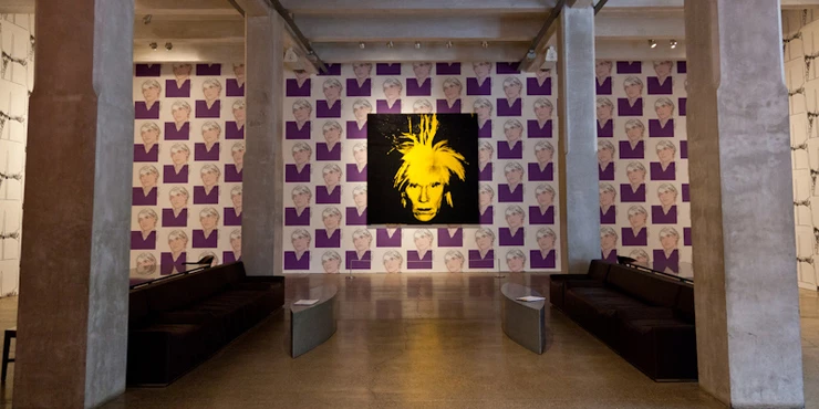 in the center, Andy Warhol's Self -Portrait from 1986