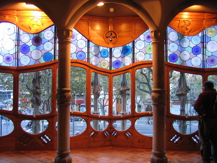 the most stunning feature of Casa battle, it's massive front window with  curves, bone-like pillars, and stained glass