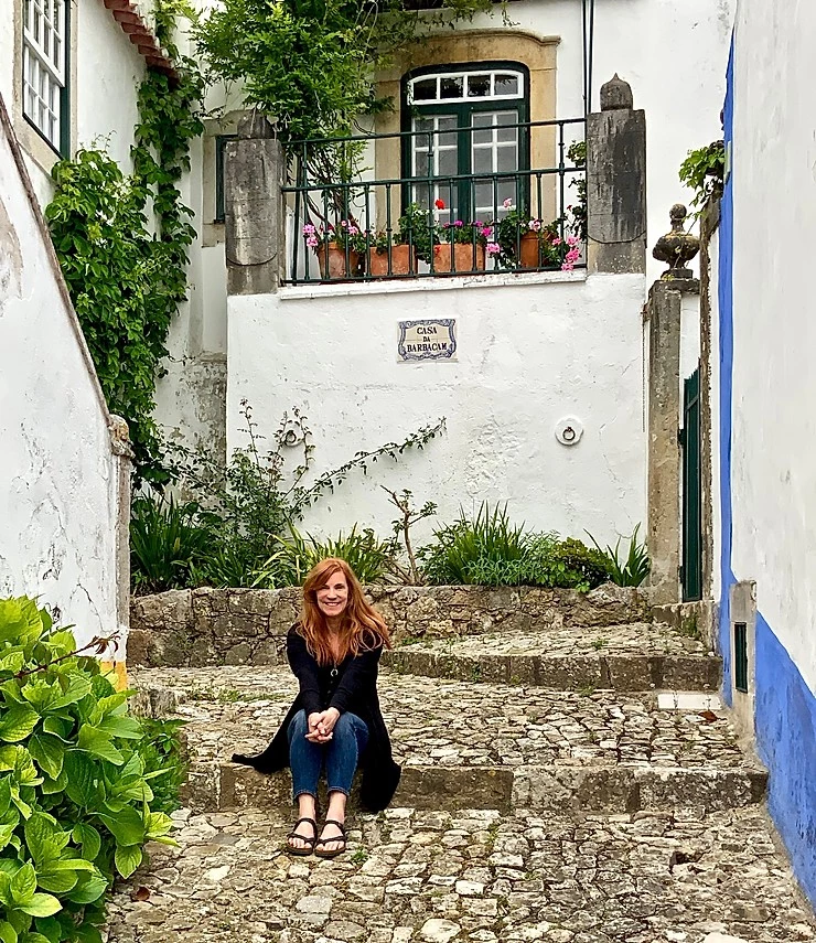 hanging out on a cobbled pedestrian street in Óbidos