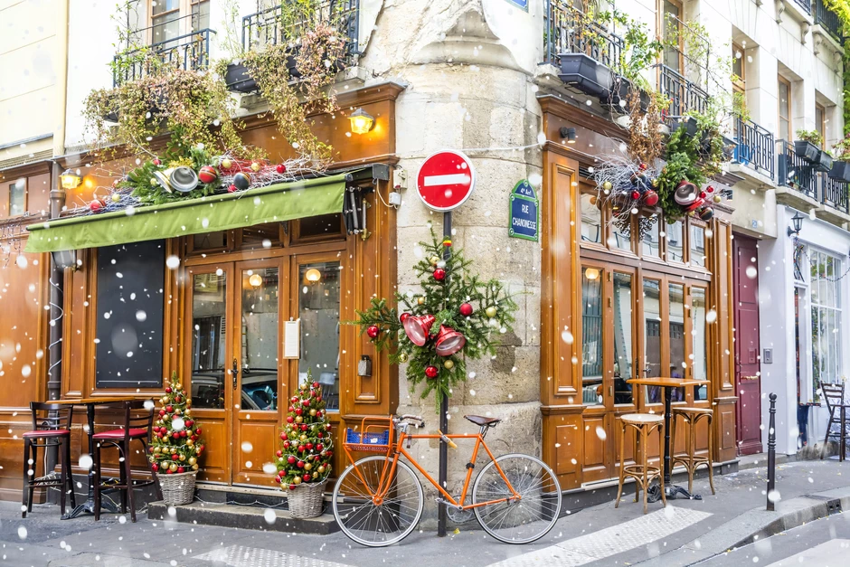 pretty Paris cafe, decorated for Christmas on a wintery day